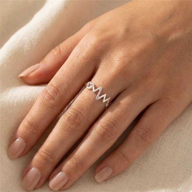 ANEL BATIMENTOS COM CORAÇÃO DE PRATA 925