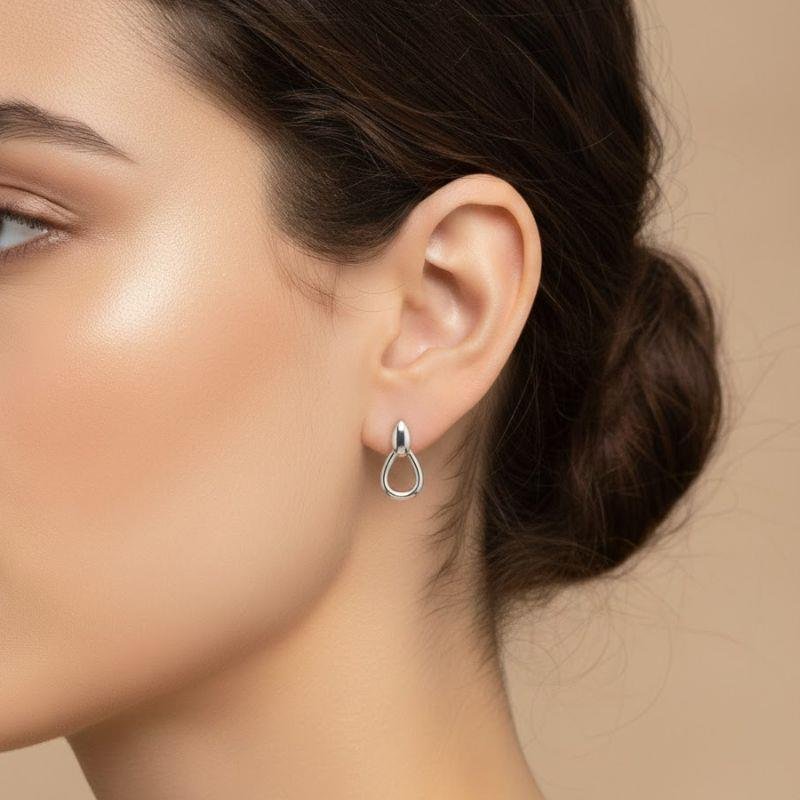 BRINCO GOTA VAZADO EM PRATA 925