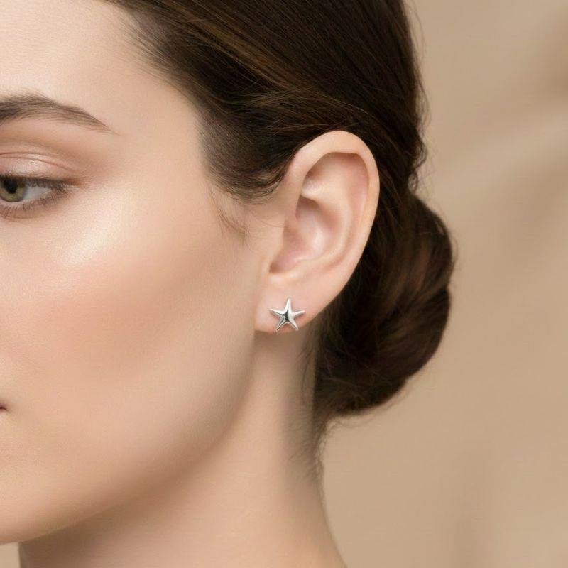 BRINCO ESTRELA LISA EM PRATA 925