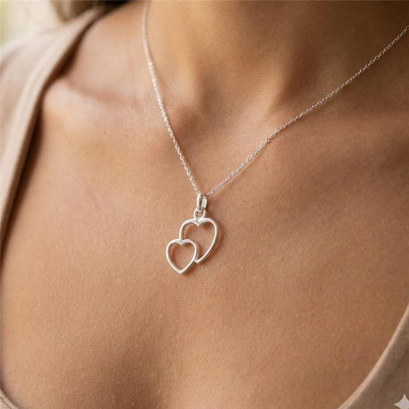 PINGENTE DOIS CORAÇÕES DE PRATA 925