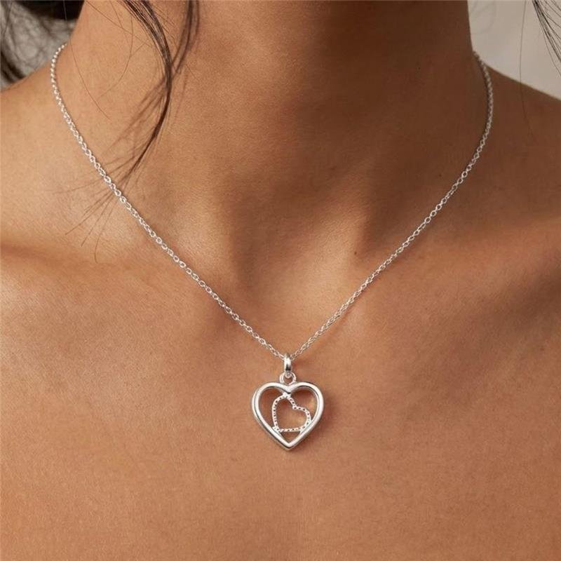 PINGENTE CORAÇÃO VAZADO DE PRATA 925
