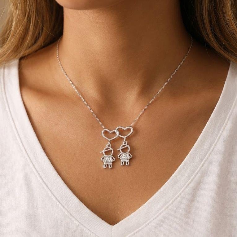 PINGENTE DOIS MENINOS DE PRATA 925