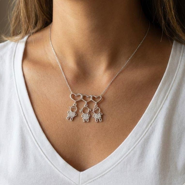 PINGENTE DOIS MENINOS E UMA MENINA DE PRATA 925