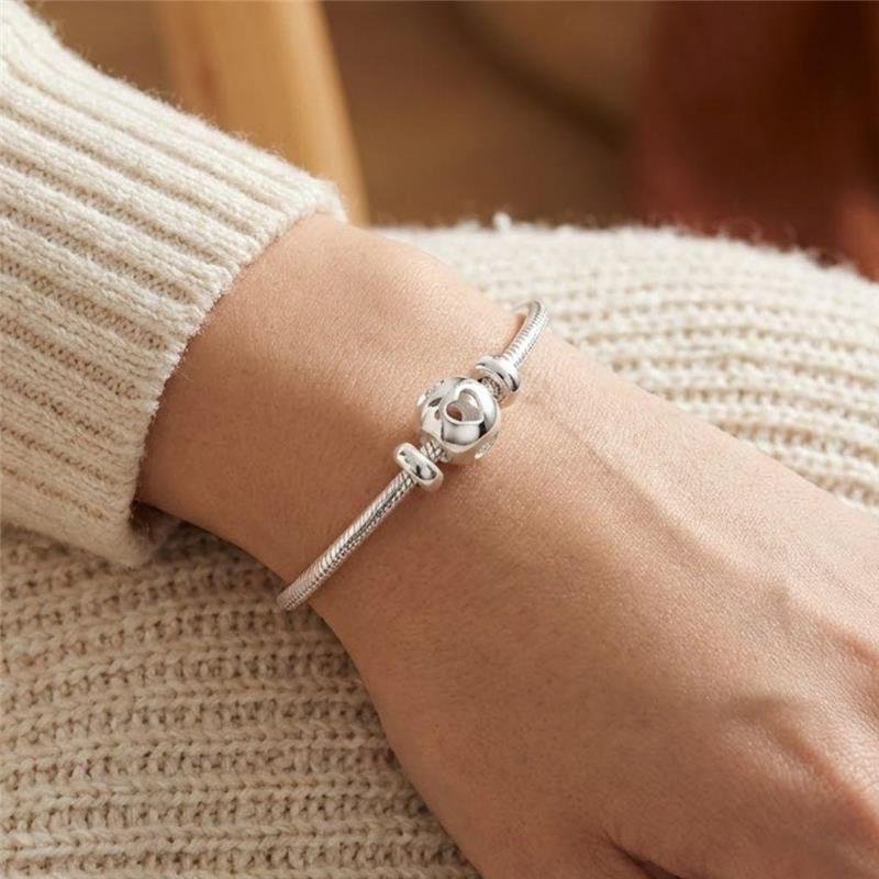 BERLOQUE ESFERA CORAÇÕES VAZADOS DE PRATA 925